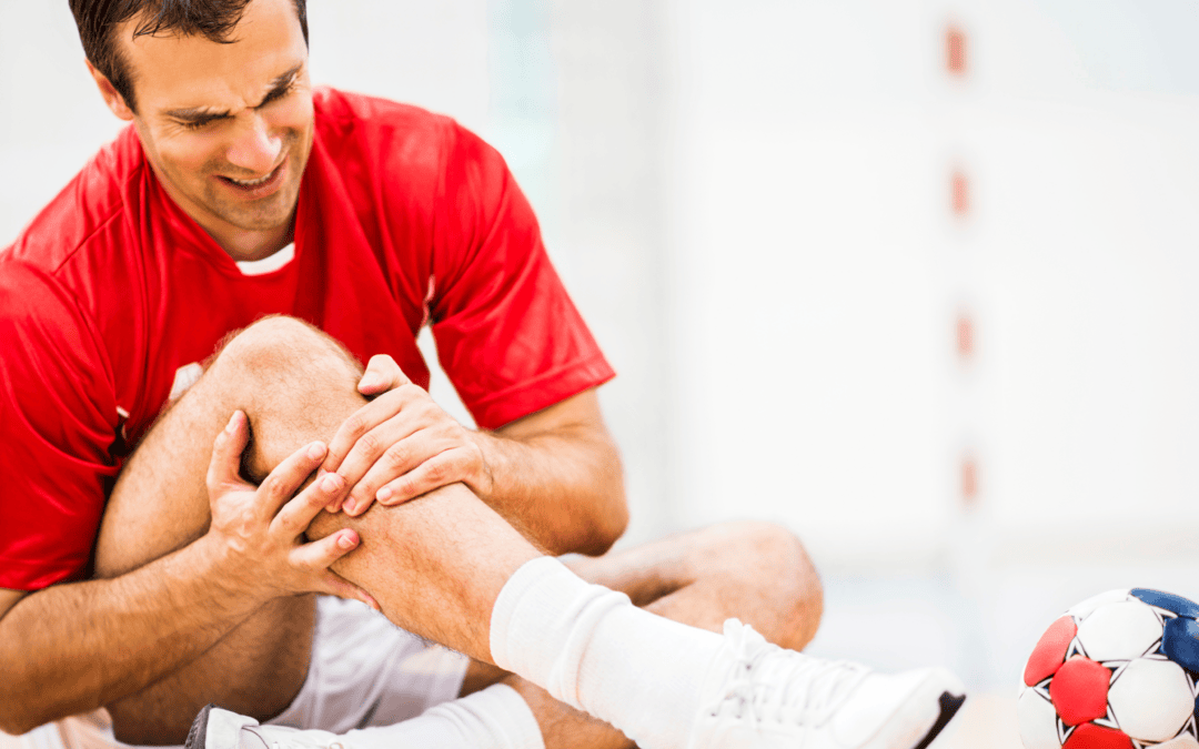Man performing knee exercise for pain relief at Northwest Suburban Pain Center.