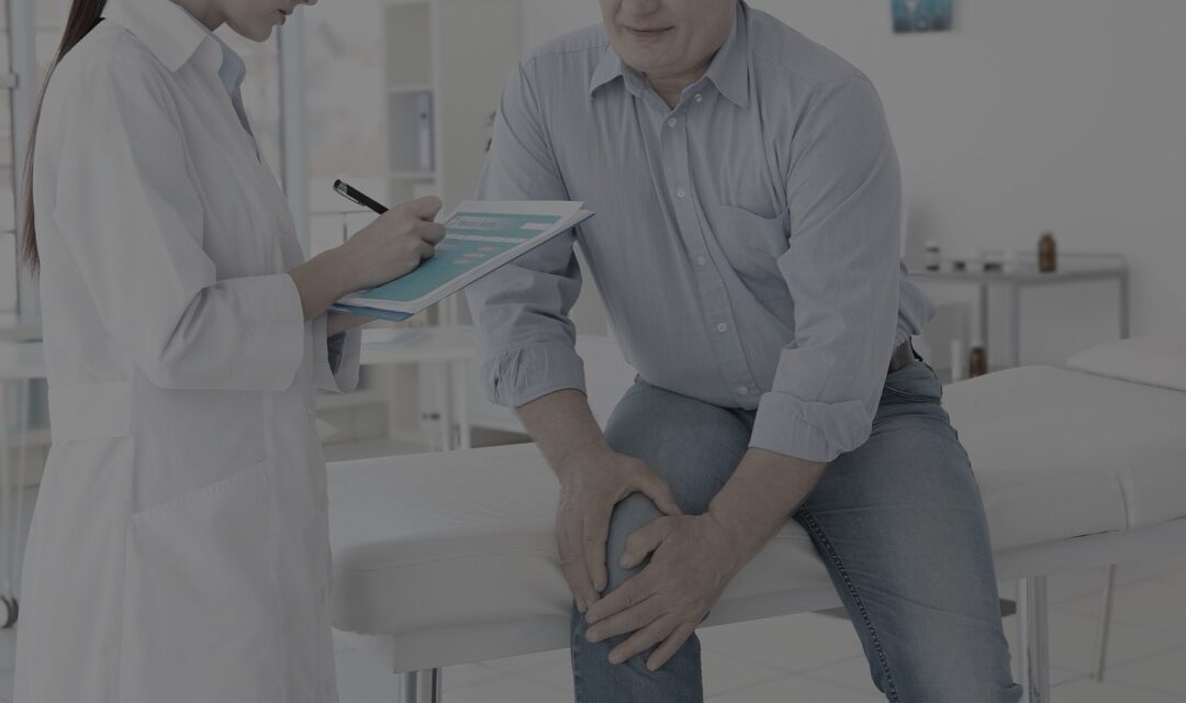 Doctor consulting with patient about pain management options.